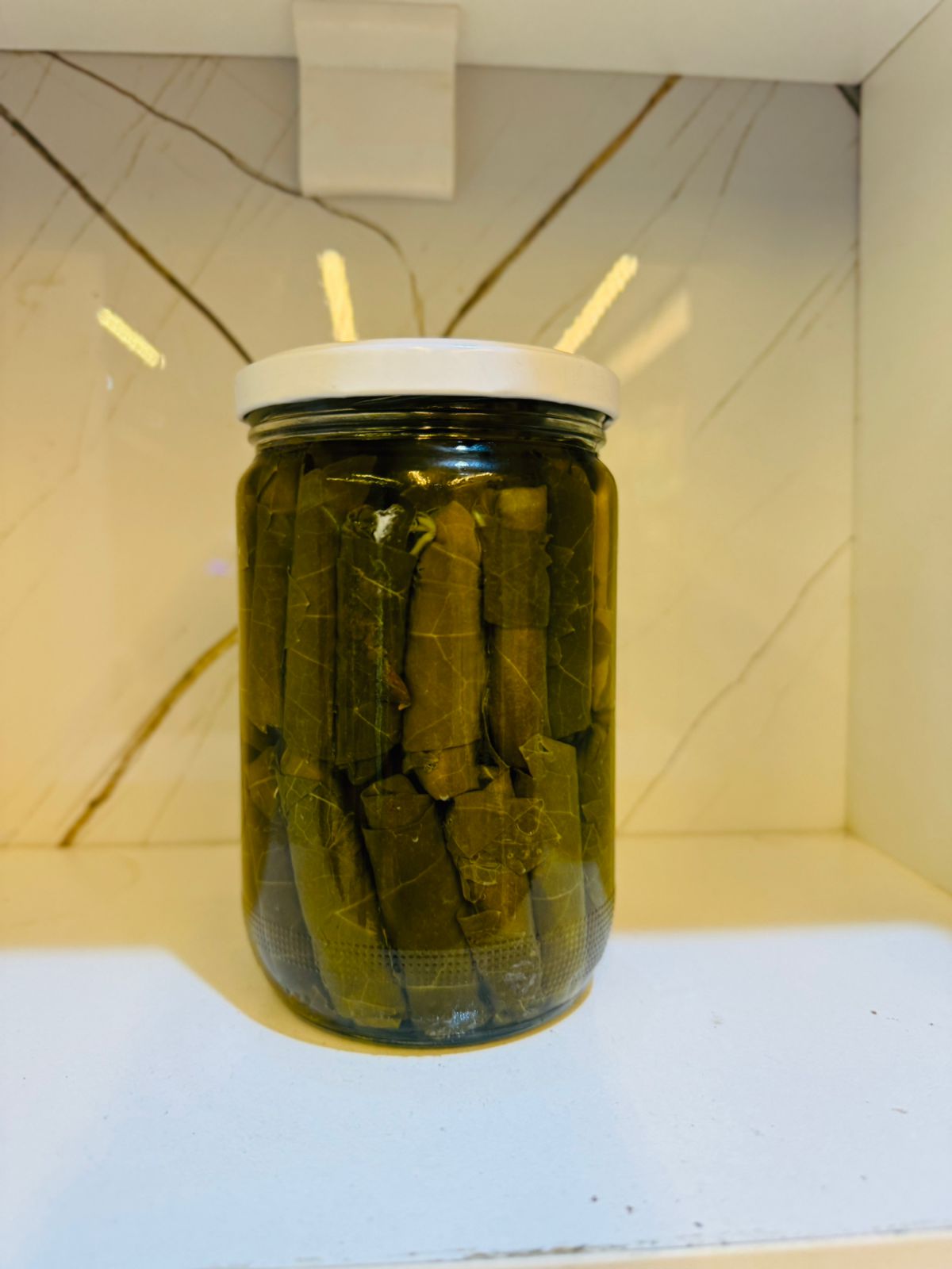 Large grape leaves stuffed with labneh